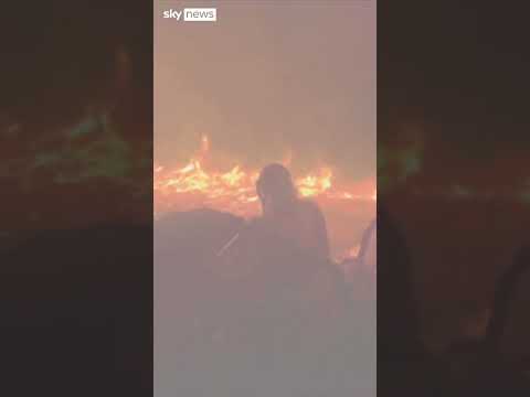 Fire engine surrounded by flames