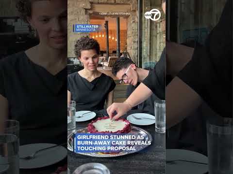 Girlfriend stunned as burn-away cake reveals touching proposal