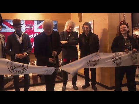 English musician Jimmy Page cut the ribbon at Gibson Garage in London, in attendance Tony Iommi, Sir