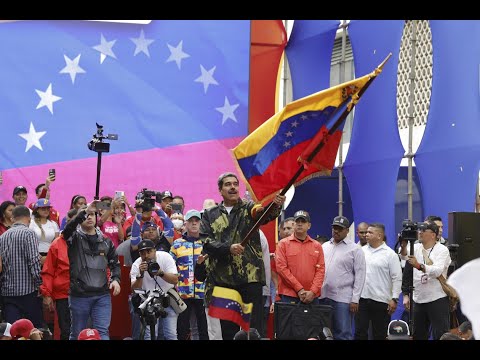 A party atmosphere in Caracas as Maduro and his challenger begin election rallies