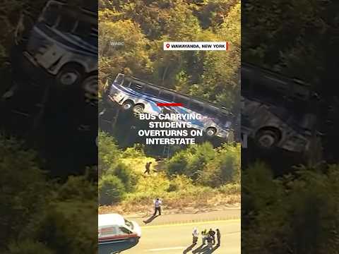 Bus carrying students overturns on interstate