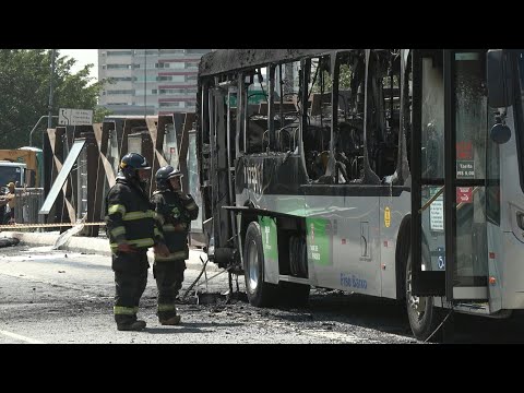 Two dead after small plane crashes on busy Sao Paulo street, hits bus | AFP