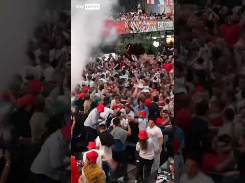 England fans celebrate Kane’s penalty