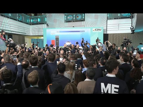 Supporters of Germany's conservatives cheer as exit polls predict win | AFP