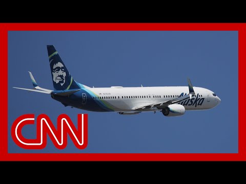 An off-duty pilot tried to take control of Alaska Airlines flight