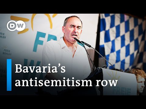 German politician keeps job despite alleged Holocaust jokes | DW News