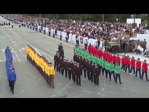 France's Bastille Day parade meets the Olympic torch relay in an exceptional year