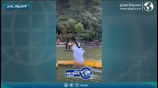 تحدي لفتاة بالجري وسط النهر