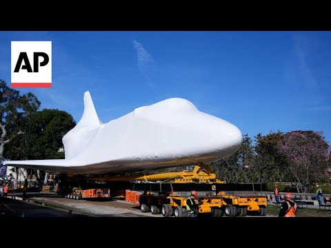 Space Shuttle Endeavour hoisted for vertical display at California Science Center