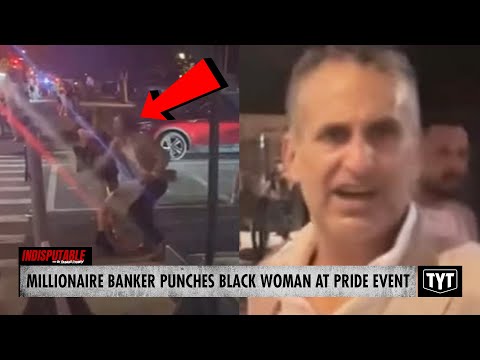 WATCH: Millionaire Banker Clobbers Black Woman In Face At Pride Event