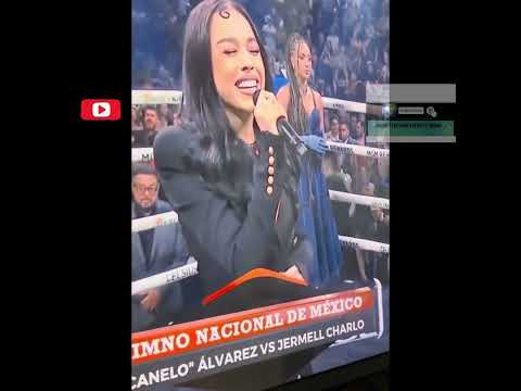 Momento en que Danna Paola cantado el himno nacional de mexico en el canelo vs charlo