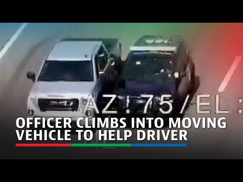 Police officer climbs from one moving vehicle into another to help driver | ABS-CBN News