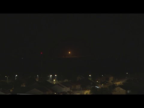 Flares light up skyline over Gaza Strip