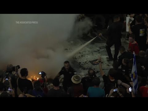 Israeli police and protesters clash in Tel Aviv amid calls for action on hostages