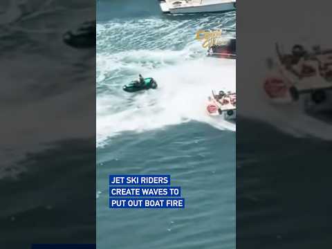 Jet ski riders create waves to put out boat fire #coolchina