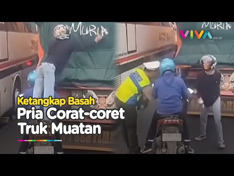 APES! Pemotor Ketangkap Basah Polisi Saat Lakukan Corat-Coret Truk