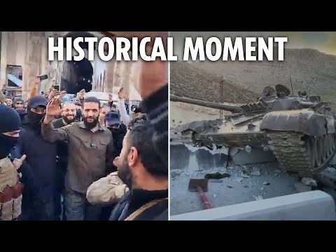 Syrian rebel leader enters Damascus to cheering crowd after Assad toppled & tank cemetery lines road