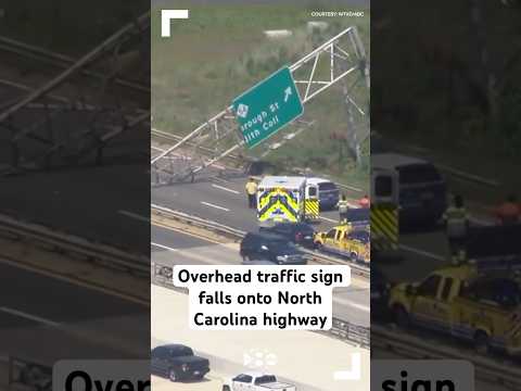 Overhead traffic sign falls onto North Carolina highway