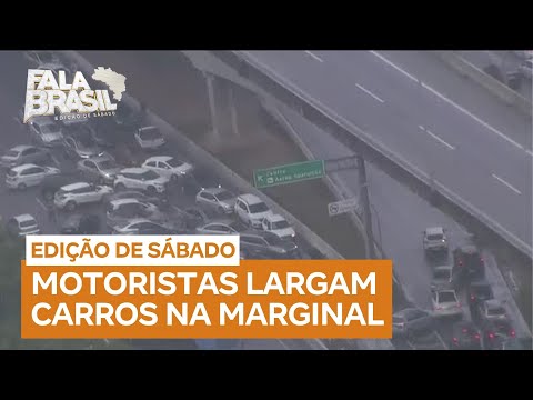 Motoristas deixam carros em pontos alagados da Marginal Tietê após chuva que atingiu SP