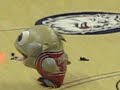 Inflatable fish mascot trucks a guy on the court and eats him