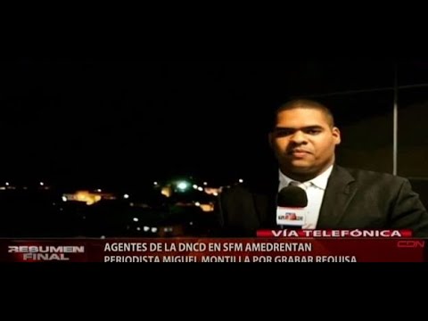 Agentes de la DNCD en SFM amedrentan periodista Miguel Montillo por grabar requisa