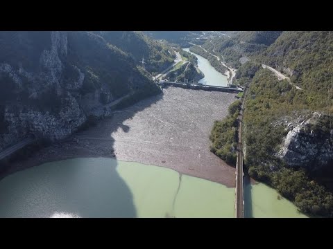 Tons of rubbish clogs river in Bosnia after flash floods and landslides