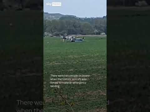 Spitfire plane crash lands in Kent field