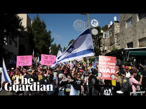 Israeli protesters march against Netanyahu's moves against officials