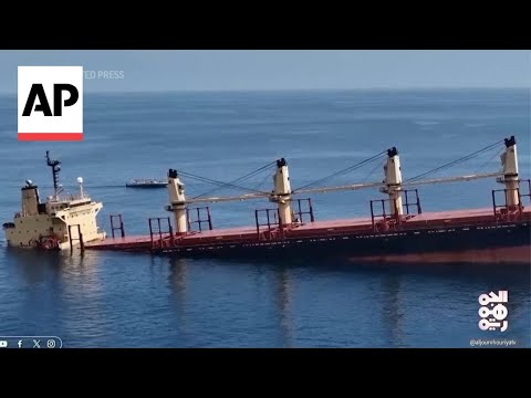 Cargo vessel partially submerged off Yemen after Houthi attack
