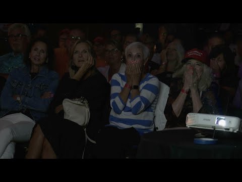 Festive pro-Trump crowd cheers on former president during debate watch party in Michigan