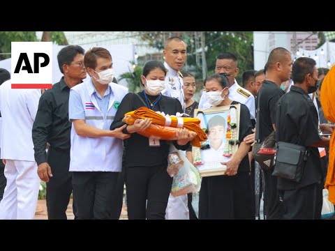 Cremation ceremony for Thai bus fire deaths held in victims' home province