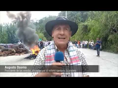 Protesta por vía maltrecha a La Pradera - Telemedellín