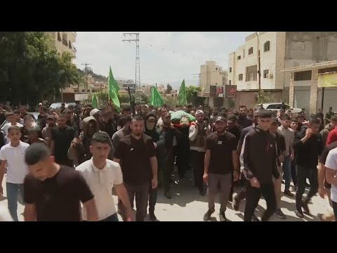 Funeral procession for two Palestinians killed in confrontations with Israeli forces in West Bank