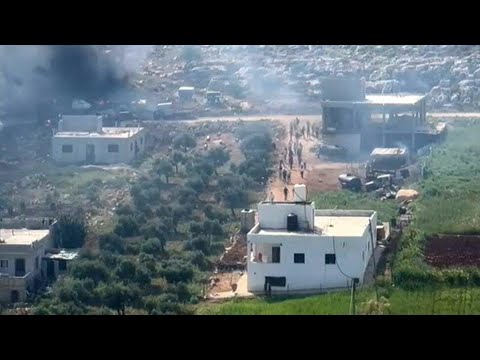 De la fumée s'échappe d'un véhicule, des colons attaquent un village en Cisjordanie | AFP Images