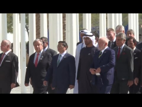 World leaders walk together into COP28 climate talks in Dubai