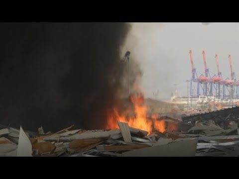 A huge fire has broken out in the Beirut port area. The cause is currently unclear. | LIVE