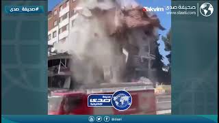 انهيار مبنى على حفارة ونجاة السائق