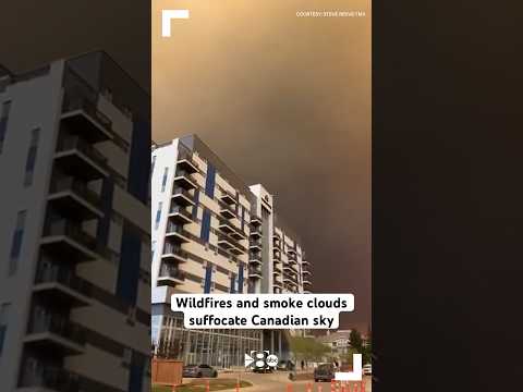 Wildfires and smoke clouds suffocate Canadian sky
