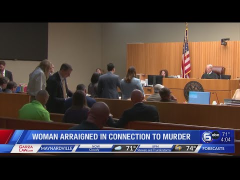 Woman arraigned in connection to murder