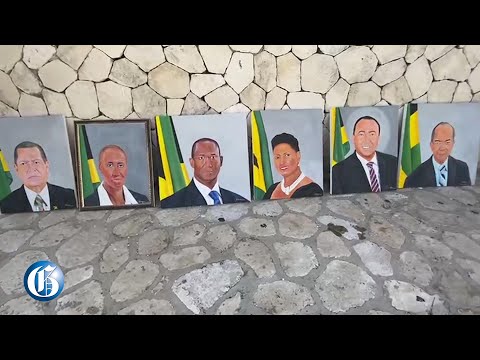 Artist displays his painting outside Jamaica Conference Centre