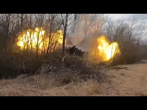 Ukrainian artillery unit fires Howitzers at Russian infantry positions in Bakhmut area