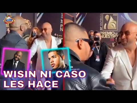 Brea Frank de relacionador público de Bulovas en Premios Lo Nuestro, le presenta a Wisin