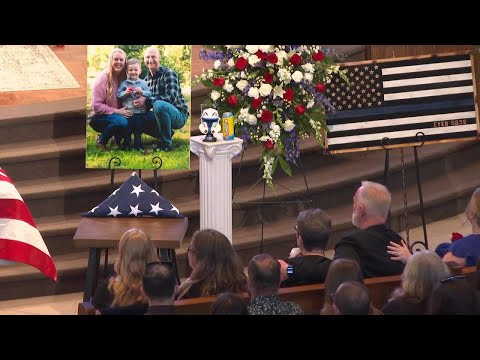 Fallen officer is remembered during a memorial service in Charlotte