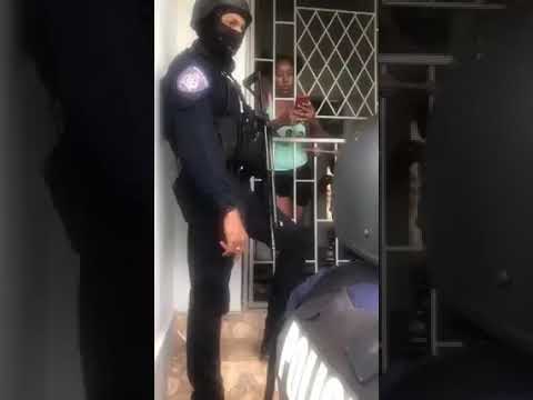 Police braking into house Trinidad
