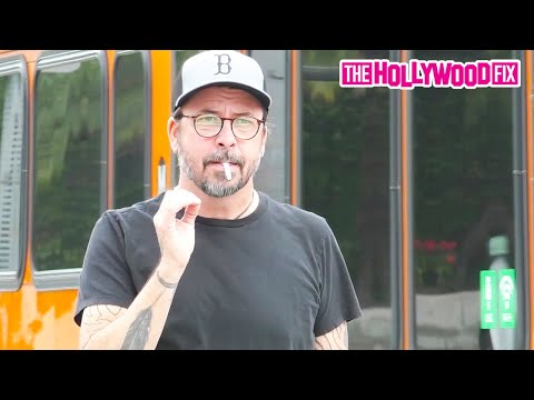 Dave Grohl Trolls Paparazzi & Ignores Annoying Questions While Out With His Wife Jordyn Blum In L.A.