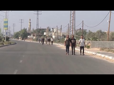 Palestinian workers return to Gaza after Israeli detention, speak of ordeal