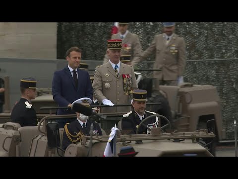 Défilé du 14 juillet : Macron arrive à la tribune présidentielle | AFP Images