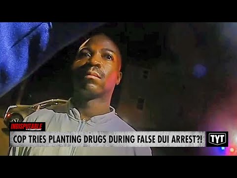 WATCH: Cop Tries Planting Drugs In Black Man's Car During False DUI Arrest, Allegedly