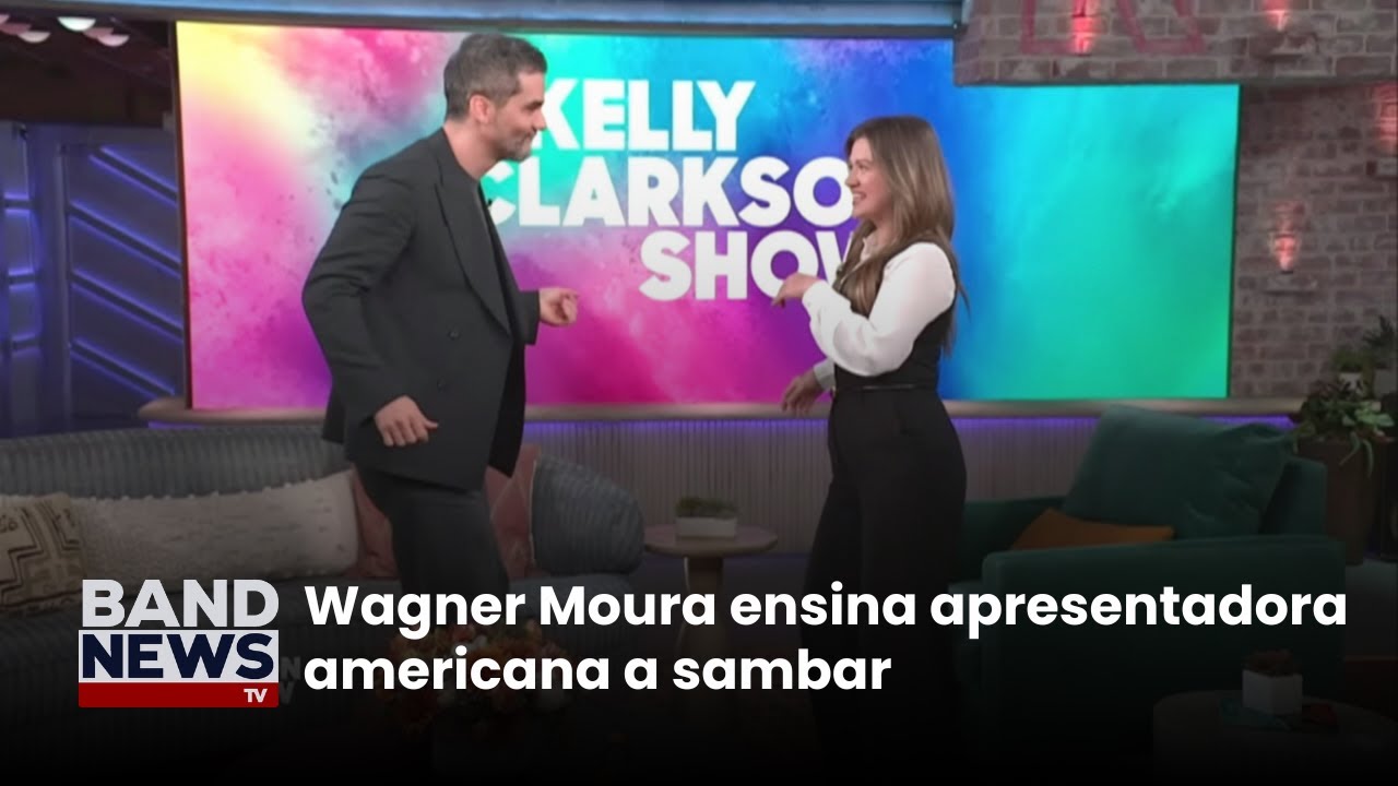 Wagner Moura ensina apresentadora americana a sambar | BandNews TV