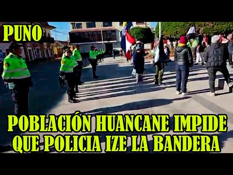 POBLACION DE HUANCANE NO PERMITRAN QUE LA POLICIA IZE LA BANDERA EL PUEBLO ESTA DE LUTO..
